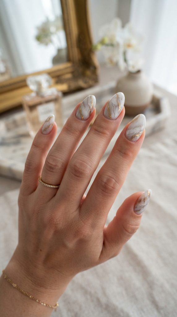 white and golden nails